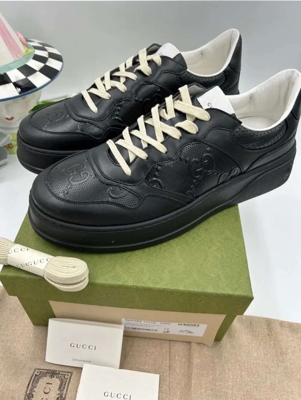 Men's Gucci, GG embossed leather sneakers size 13 fits 13.5 US made in Italy